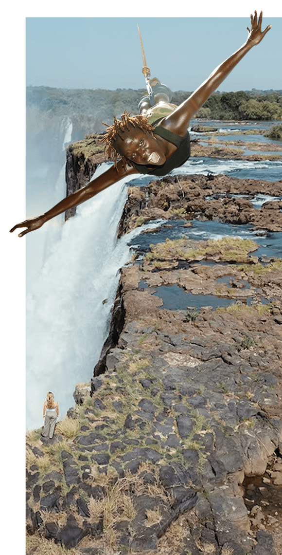 In-depth features - Person jumping by waterfall